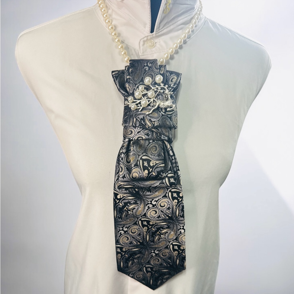 Van Heusen Black, Gold, And Silver Necktie With Reindeer Brooch